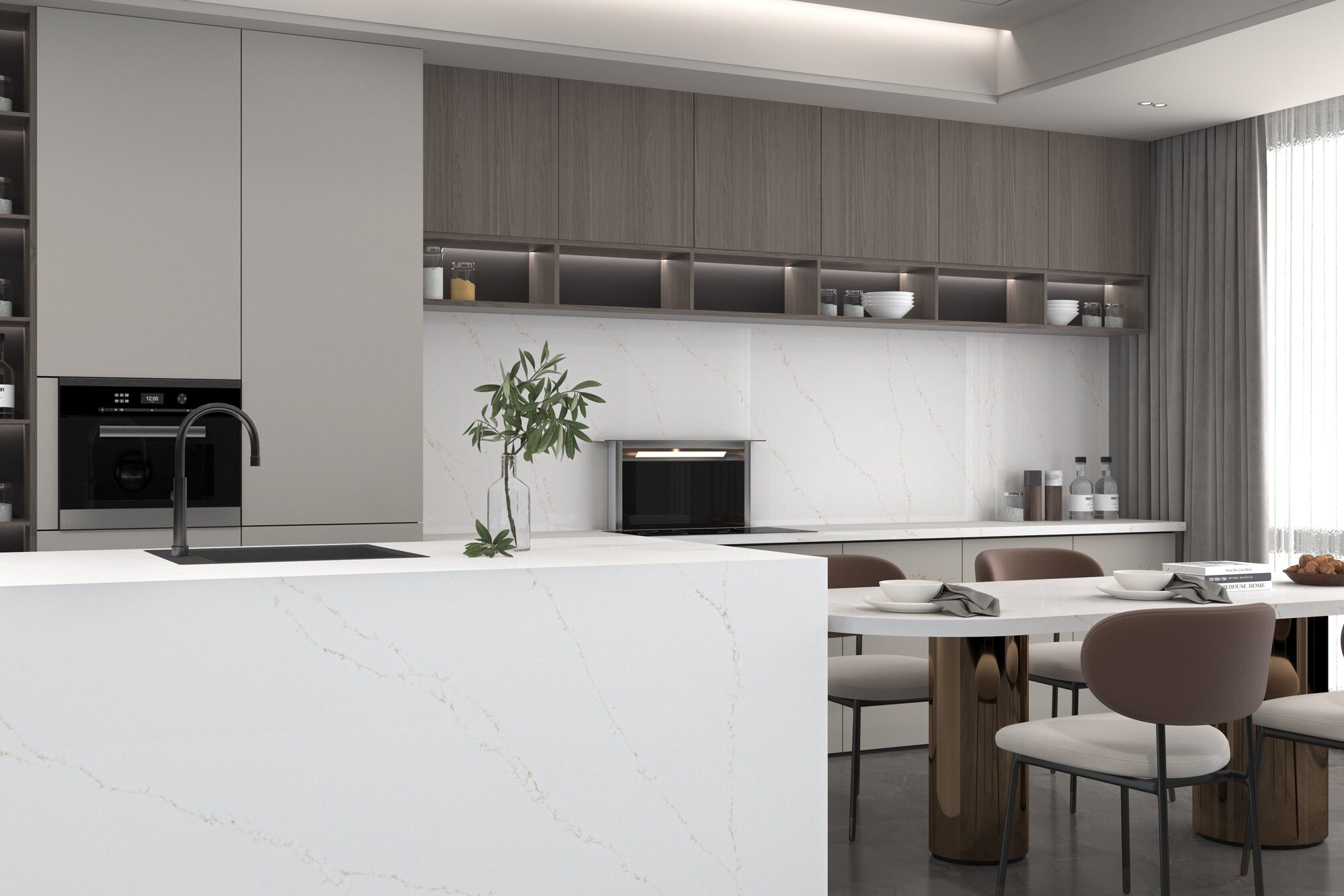 A modern kitchen island in marble beside the dining setting