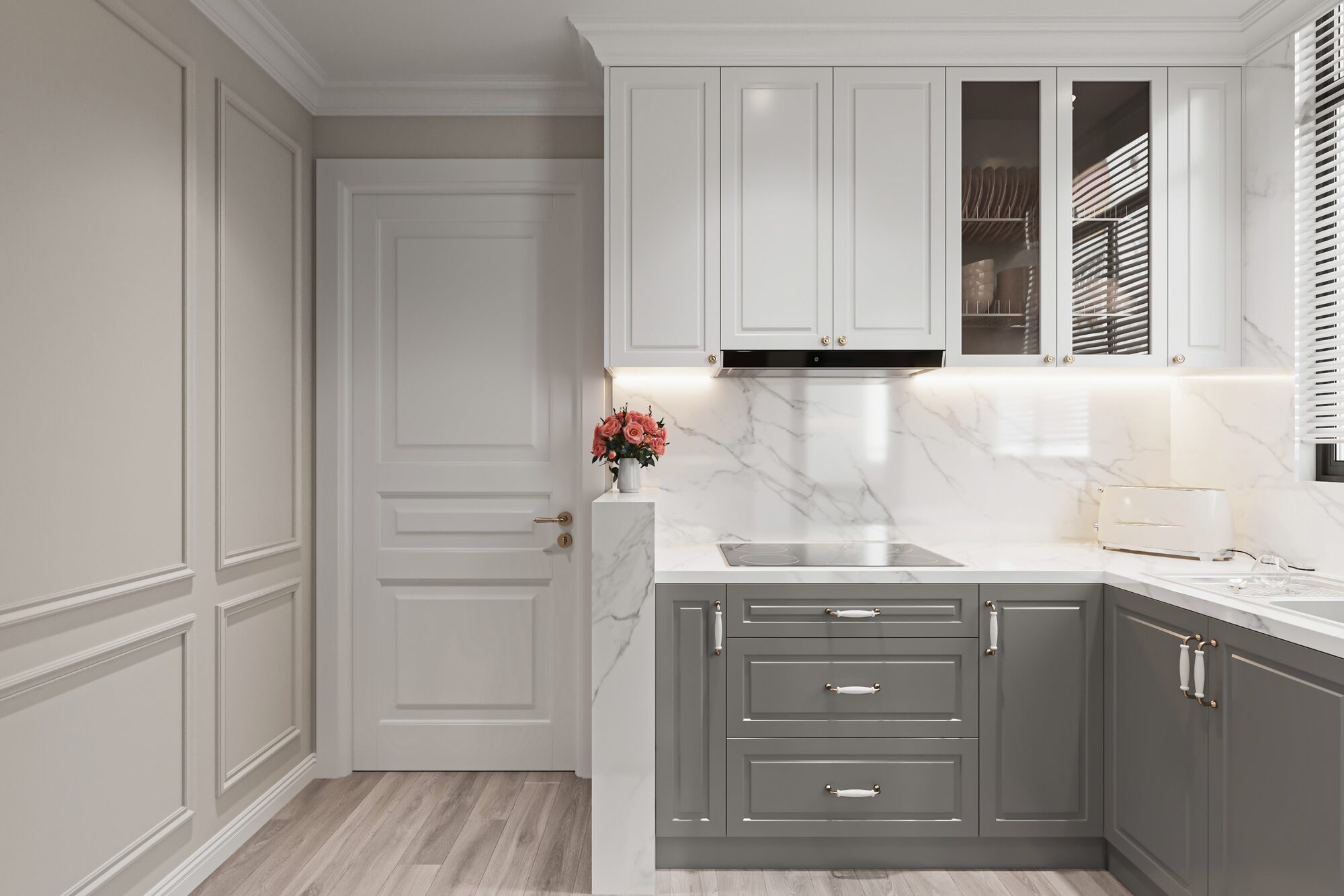A classic shaker kitchen in grey and white with a marble splashback
